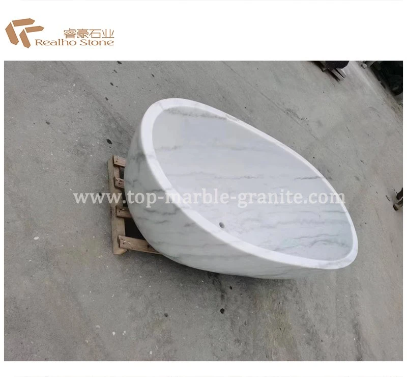 white stone bath tub