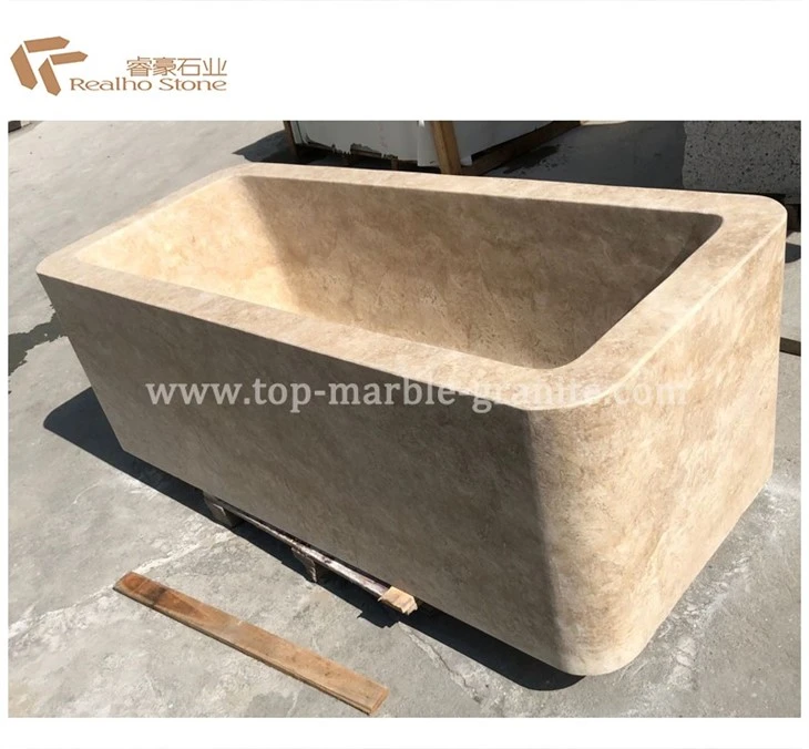 Beige travertine bathtub