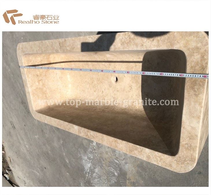 beige marble bathtub