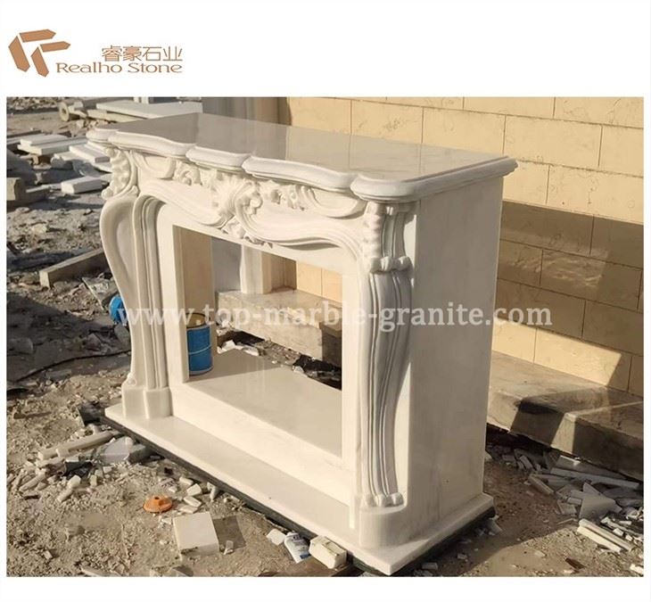 Beige marble fireplace