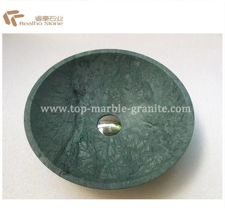 round stone vessel sink